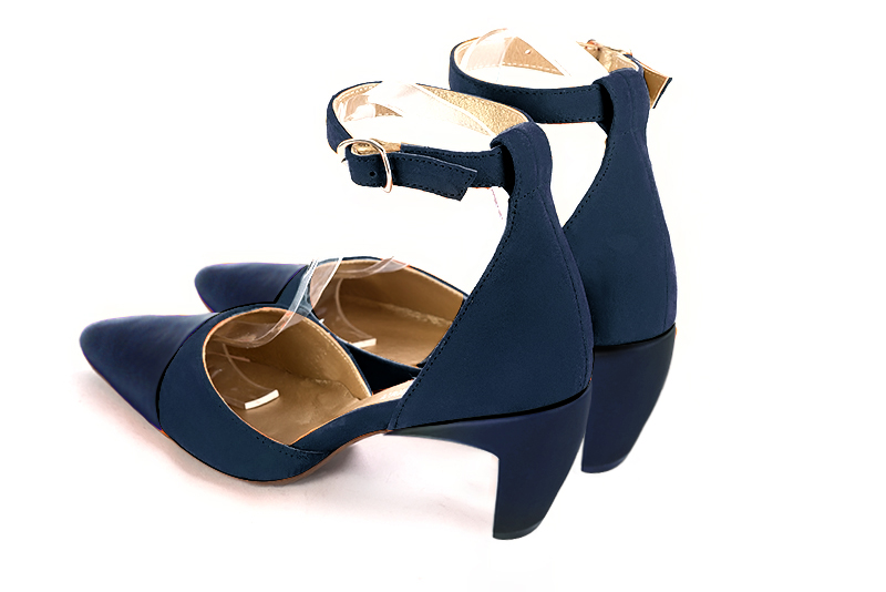 Navy blue women's open side shoes, with a strap around the ankle. Tapered toe. Medium comma heels. Rear view - Florence KOOIJMAN